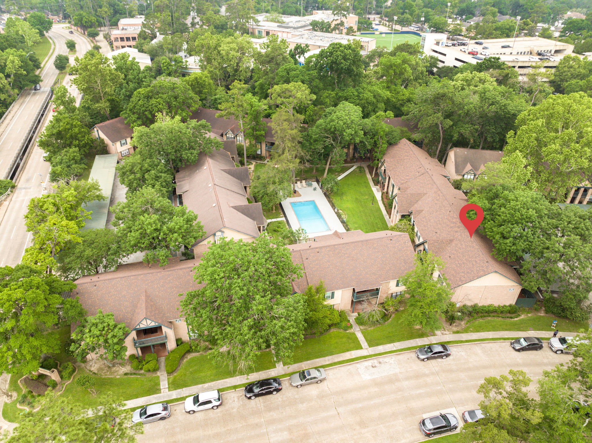 8229 Kingsbrook Road, Unit 229 Houston, TX 77024 - Photo 50 of 50 an aerial view of a house with garden space and street view