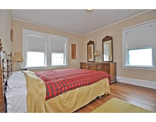 196 Chiswick Road Boston, MA 02135 - Photo 15 of 23 a bedroom with a bed and window
