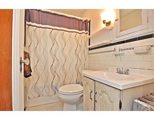 196 Chiswick Road Boston, MA 02135 - Photo 18 of 23 a bathroom with a sink a toilet and shower