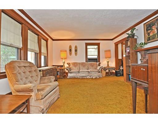 196 Chiswick Road Boston, MA 02135 - Photo 3 of 23 a living room with furniture and a large window