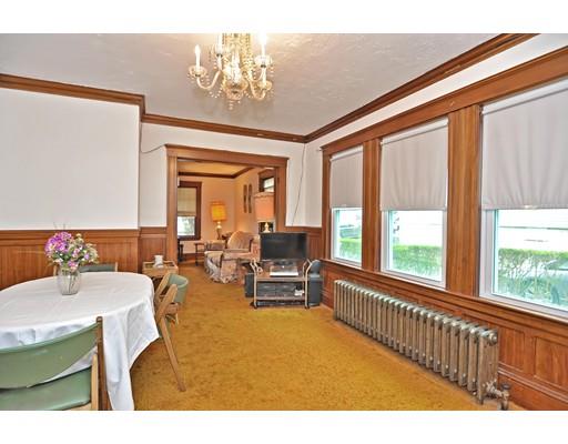 196 Chiswick Road Boston, MA 02135 - Photo 6 of 23 a living room with furniture and large windows