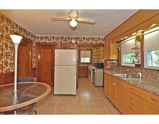 196 Chiswick Road Boston, MA 02135 - Photo 9 of 23 a kitchen with sink cabinets and refrigerator