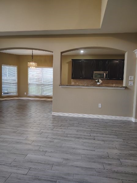 25211 Pineglen Terrace Drive Spring, TX 77389 - Photo 11 of 40 Family room open to kitchen and kitchenette