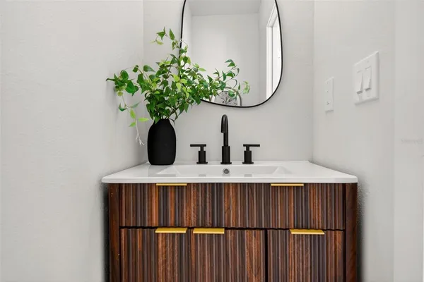 a vase of flowers sitting on a table