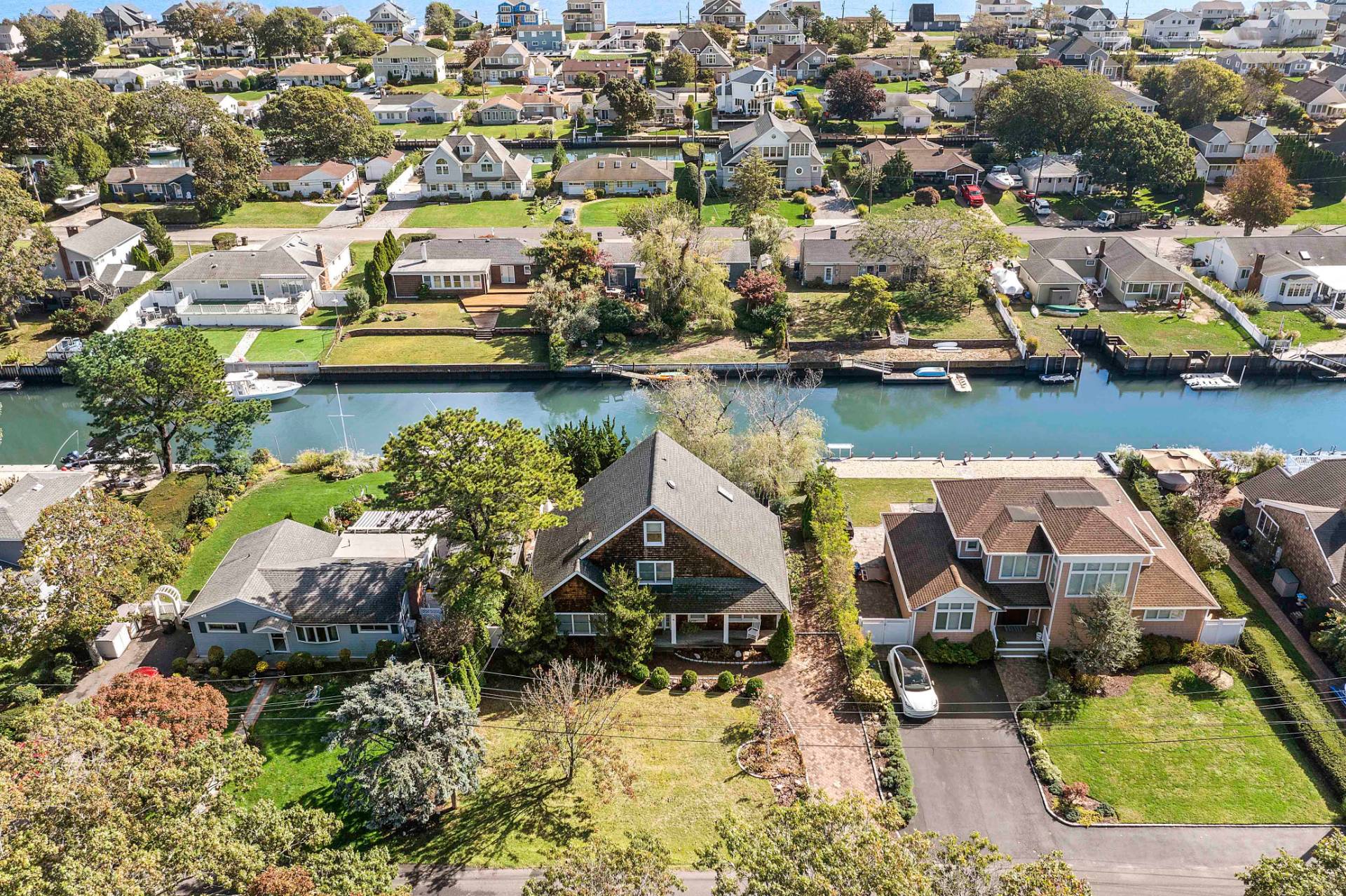 23 Whiting Road East Quogue, NY 11942 - Photo 18 of 21 an aerial view of residential houses with outdoor space