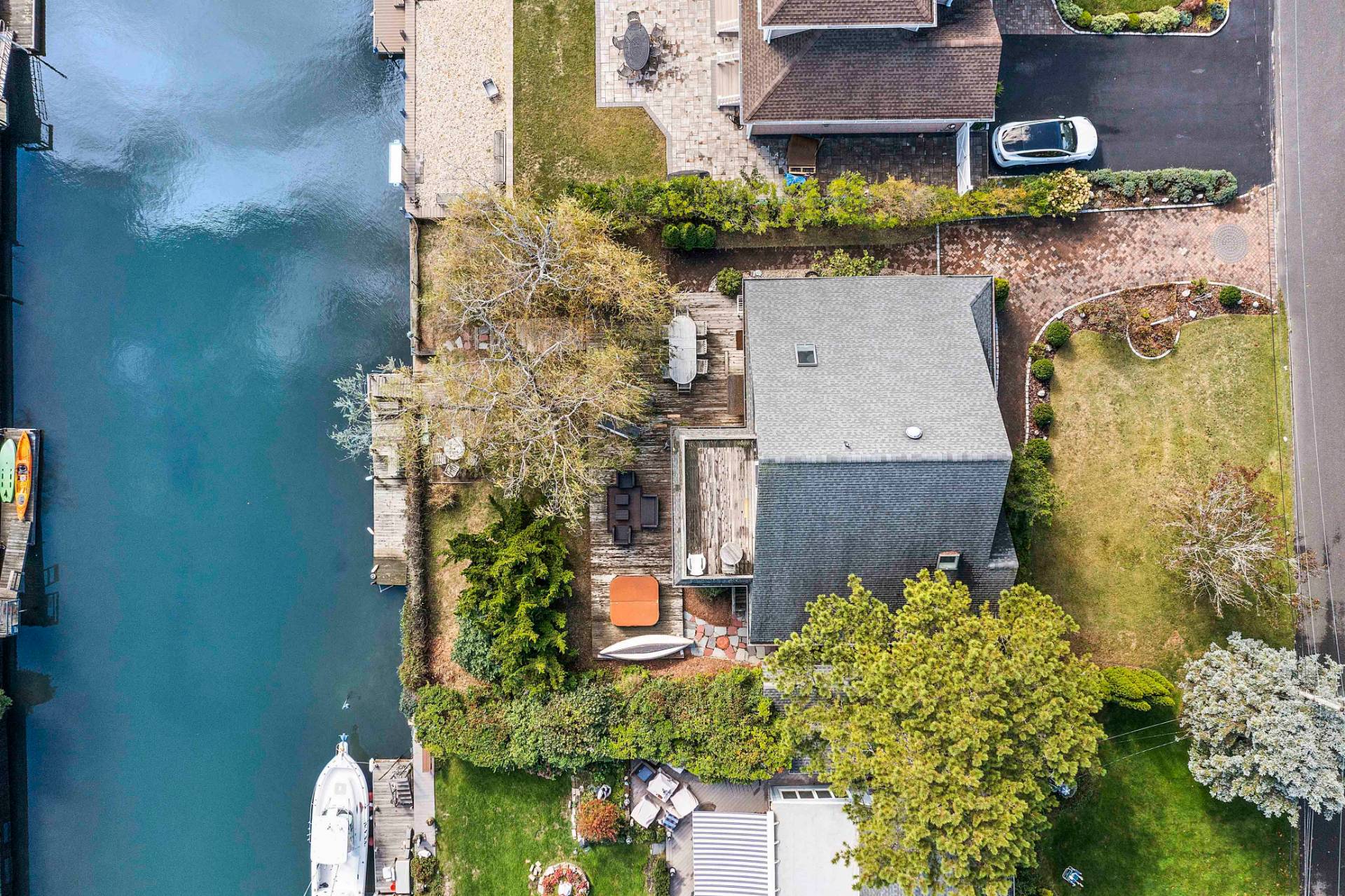23 Whiting Road East Quogue, NY 11942 - Photo 20 of 21 an aerial view of a house with a yard