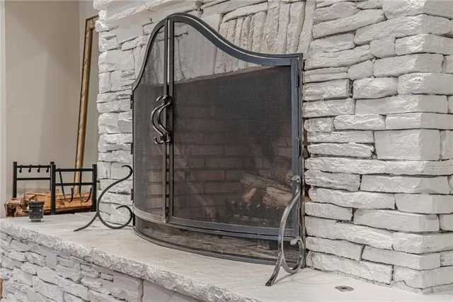 a kitchen with a stove and cabinets