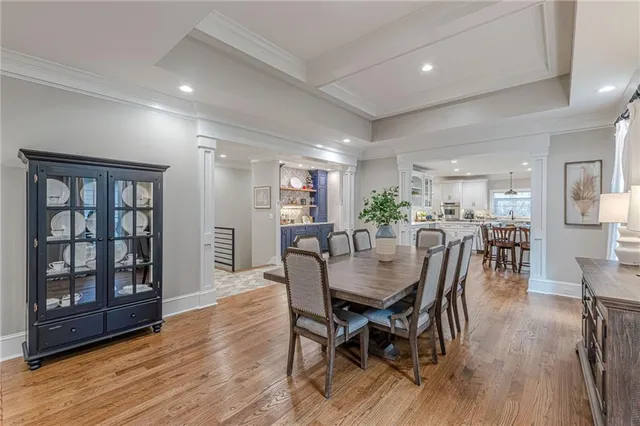 a kitchen with stainless steel appliances a refrigerator and a stove top oven