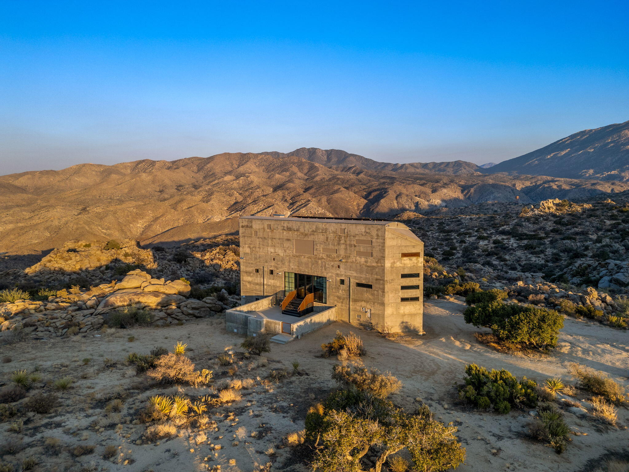 60240 Juniper Road Mountain Center, CA 92561 - Photo 36 of 37 an aerial view of a houses with a yard