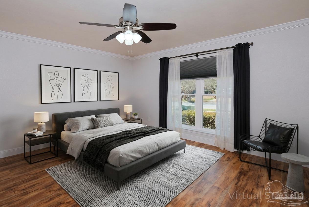 1908 Joshua Drive Cantonment, FL 32533 - Photo 23 of 47 a bedroom with a large bed and a window