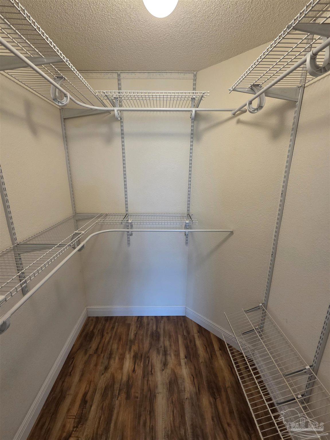 1908 Joshua Drive Cantonment, FL 32533 - Photo 27 of 47 a view of a room with racks on the wall