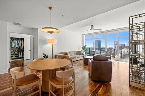 a view of a dining room with furniture window and outside view