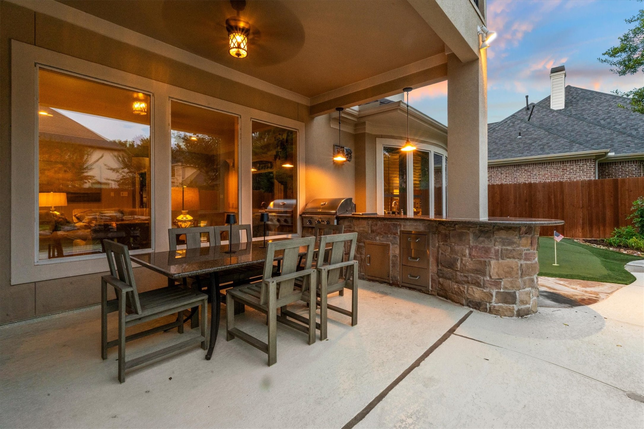 15415 Prade Ranch Lane Cypress, TX 77429 - Photo 43 of 50 Outdoor kitchen with stone counters and large bar