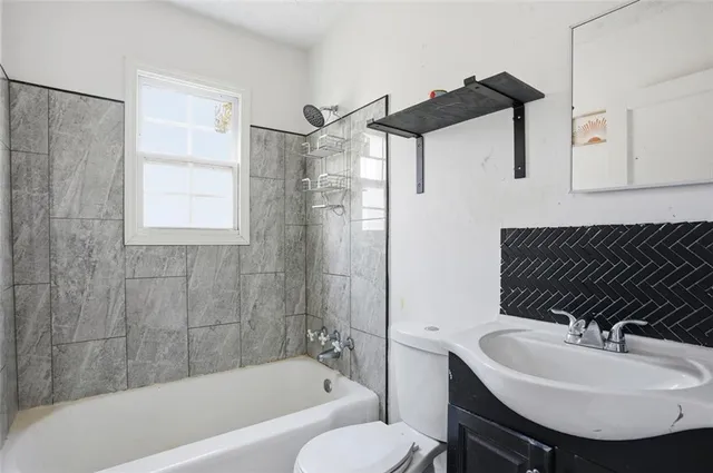 a bathroom with a sink and a bathtub
