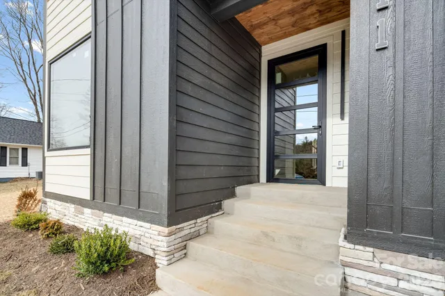 a view of entrance gate of a house