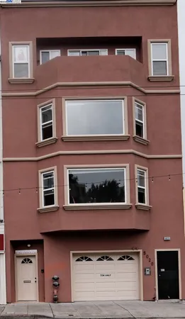 a building with a window and balcony
