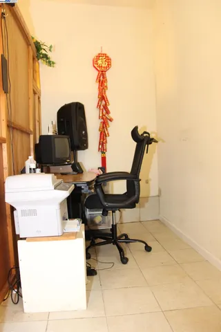 a bedroom with a bed and lamp