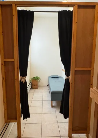 a view of a bathroom with a tub and shower