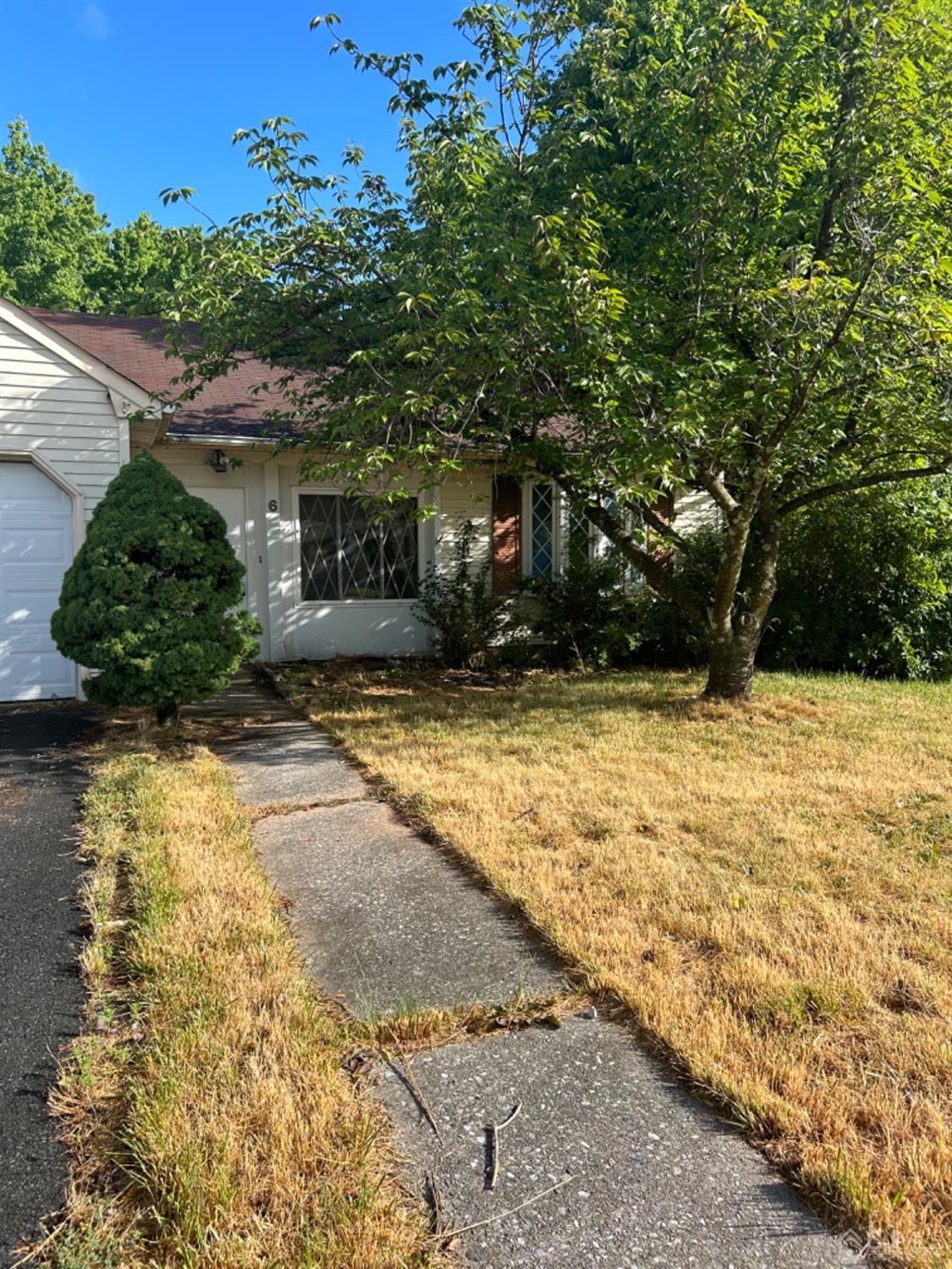 6 Woodbury Road Edison, NJ 08820 - Photo 15 of 18 a view of a house with a yard