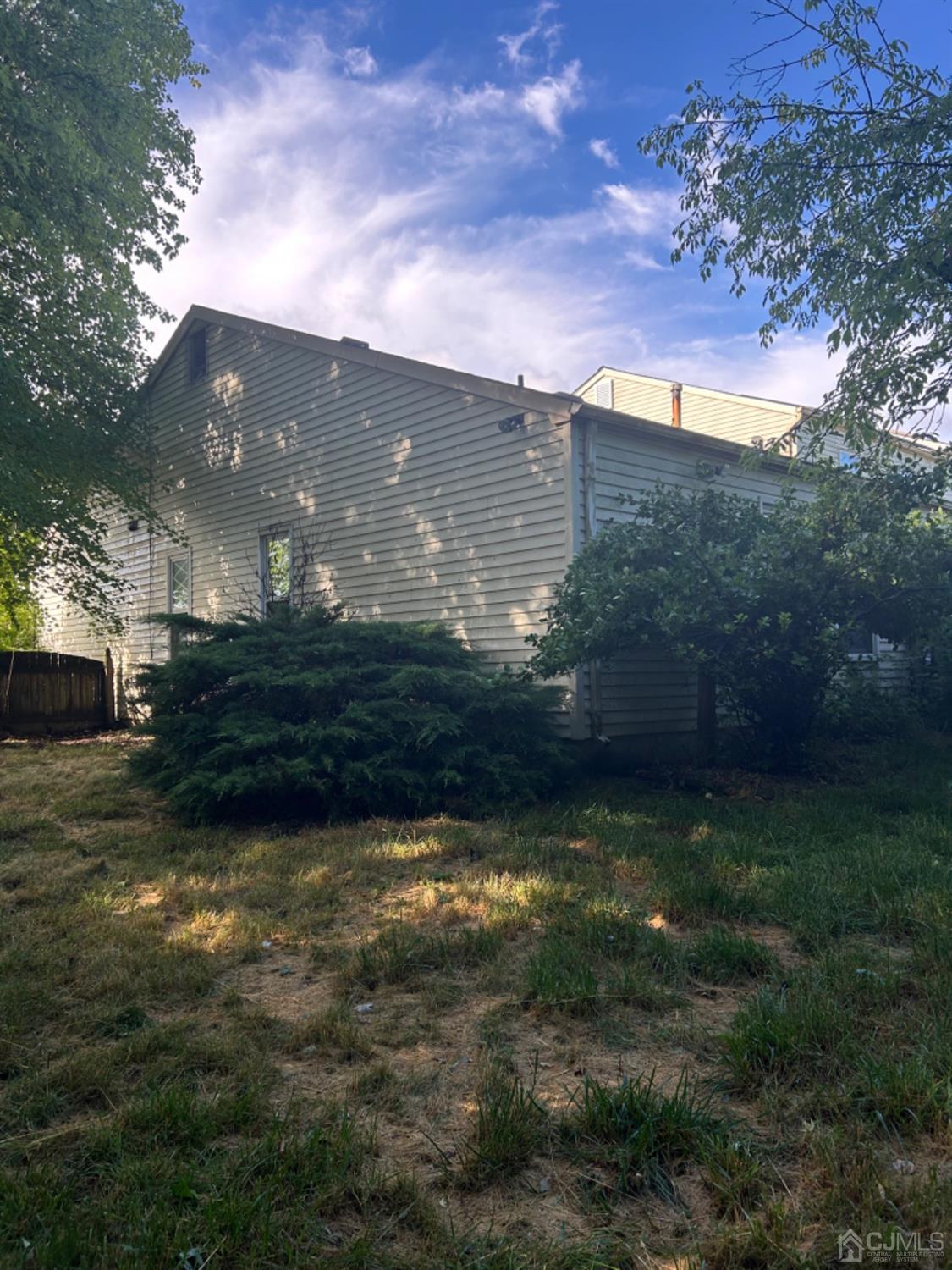 6 Woodbury Road Edison, NJ 08820 - Photo 2 of 18 a view of a big yard