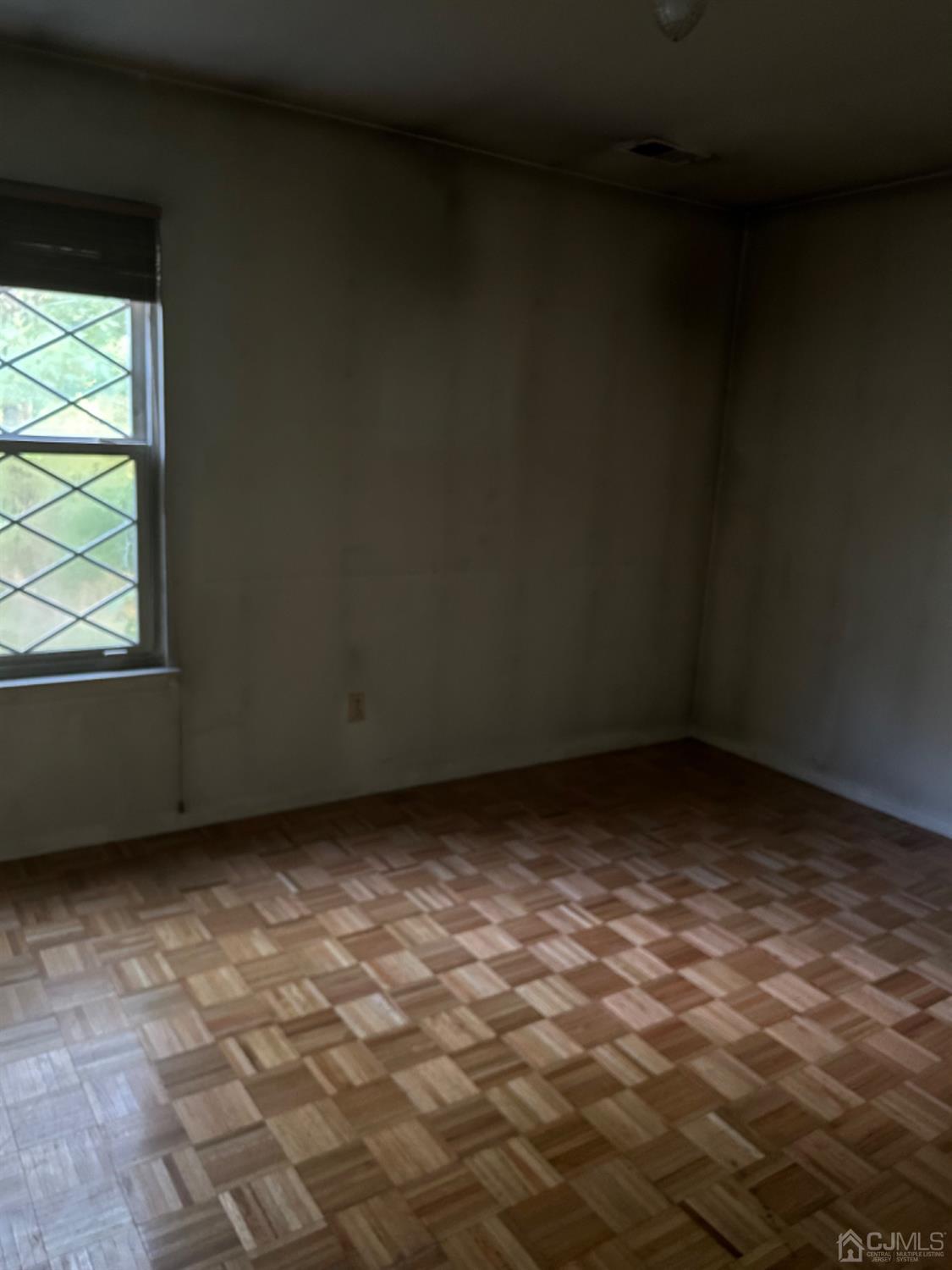 6 Woodbury Road Edison, NJ 08820 - Photo 6 of 18 a view of a room with window