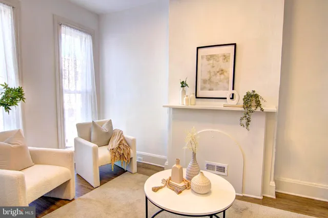 a room with furniture and a mirror