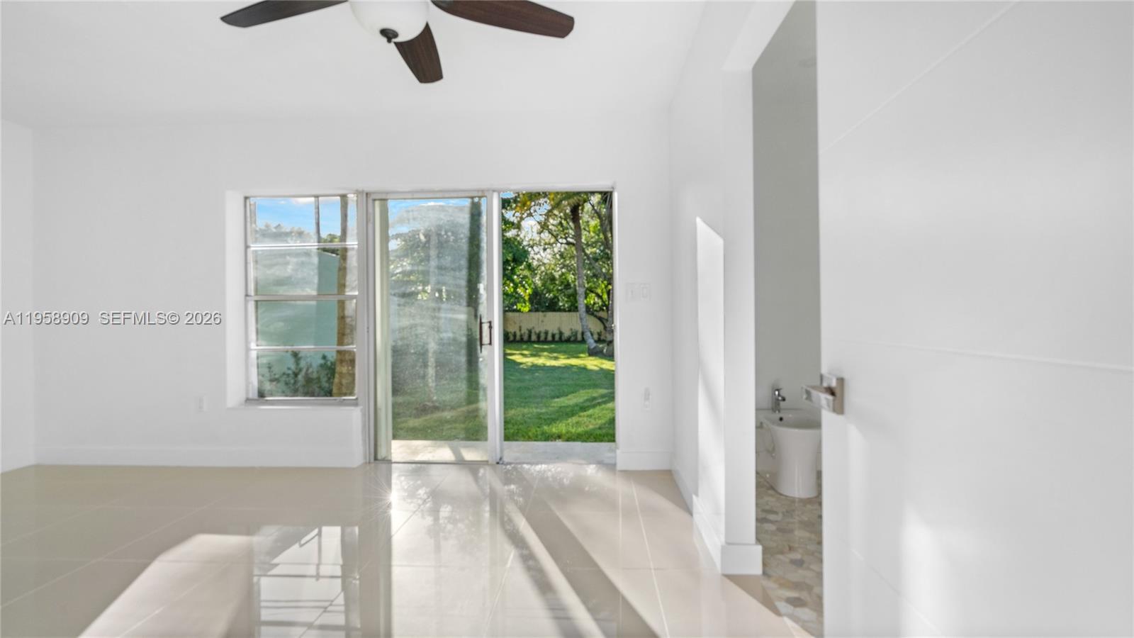 8614 Southwest 102nd Place Miami, FL 33173 - Photo 23 of 44 a view of a room with a large window