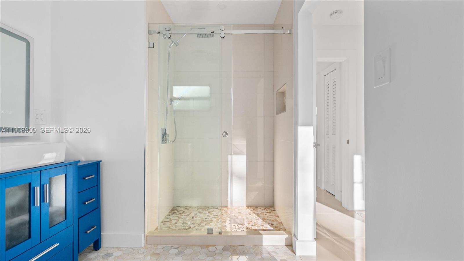 8614 Southwest 102nd Place Miami, FL 33173 - Photo 27 of 44 a view of a bathroom with a shower and a sink