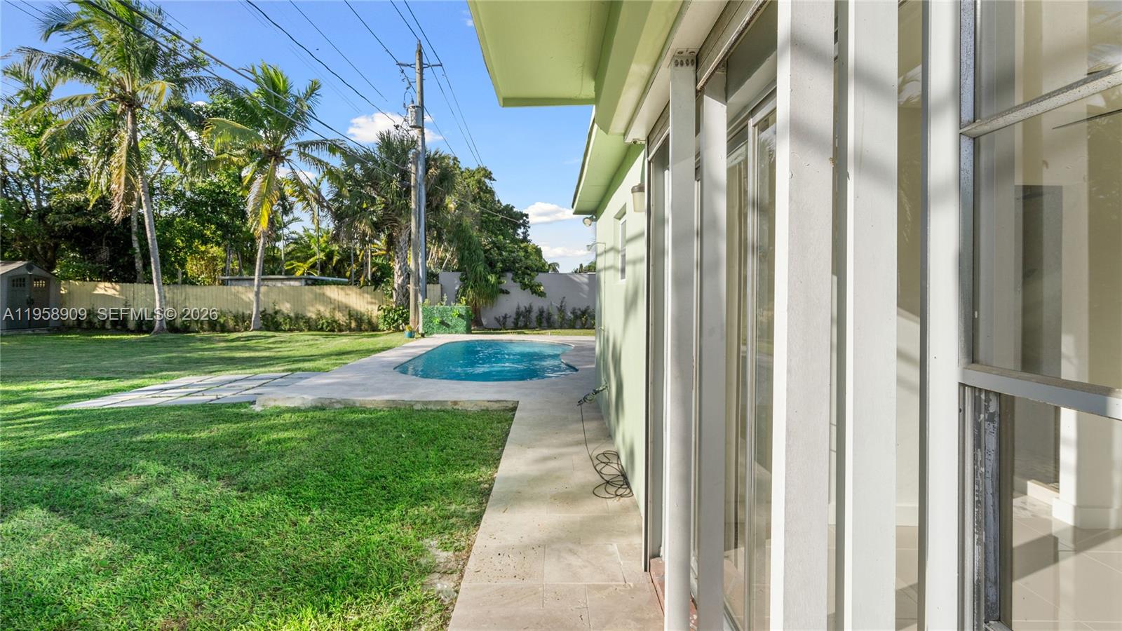8614 Southwest 102nd Place Miami, FL 33173 - Photo 29 of 47 a view of backyard with patio