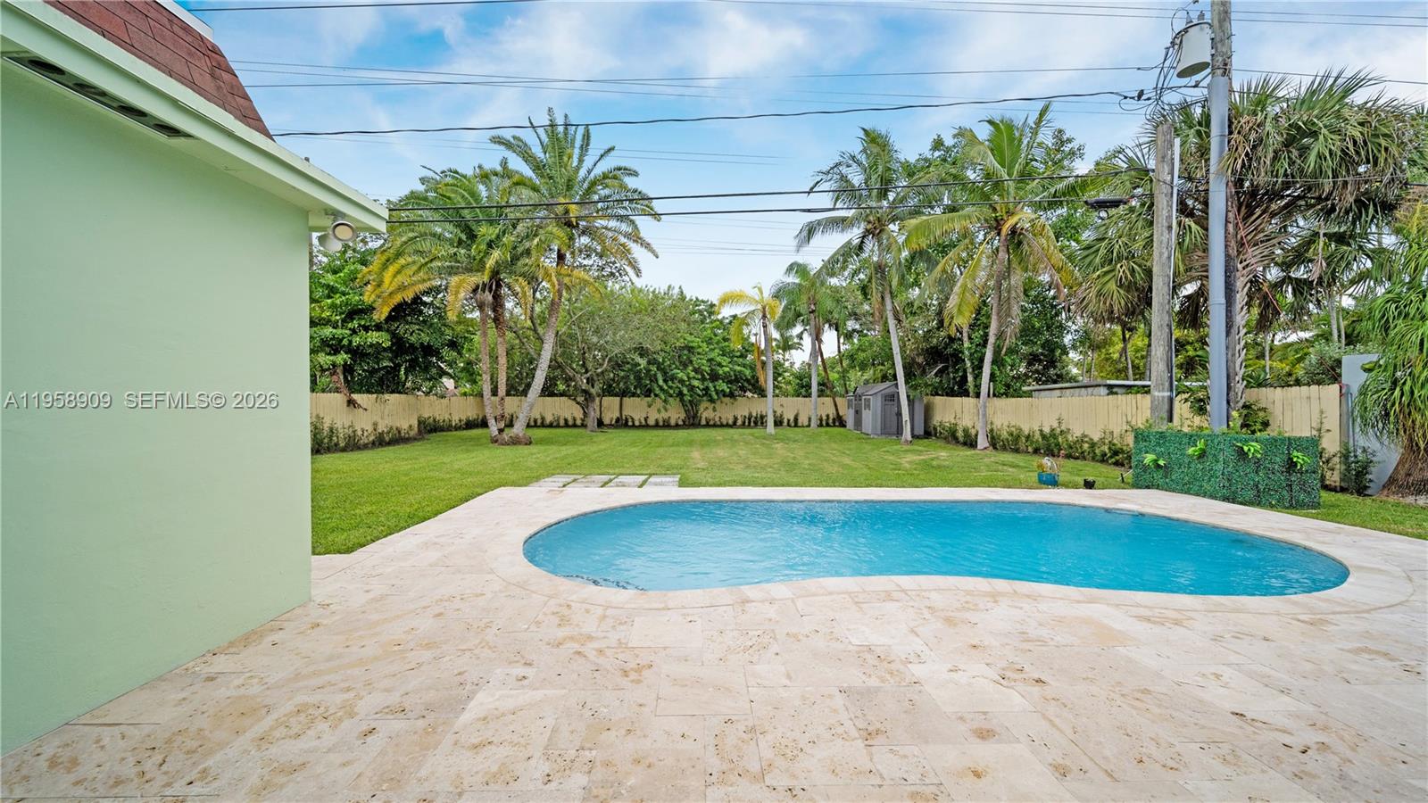 8614 Southwest 102nd Place Miami, FL 33173 - Photo 32 of 44 a view of outdoor space yard and swimming pool
