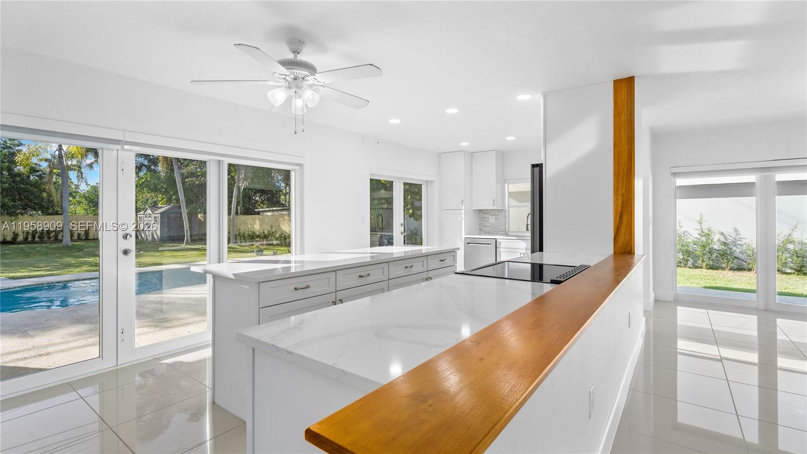 8614 Southwest 102nd Place Miami, FL 33173 - Photo 9 of 47 a spacious bathroom with a tub and sink