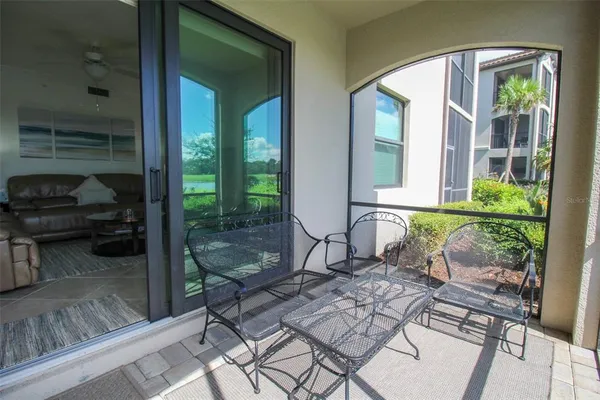 a view of a lake with a outdoor space