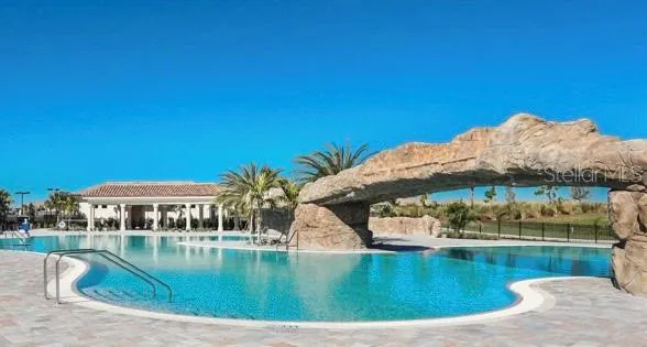 a view of a lake with a yard