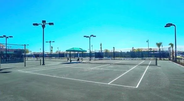 a view of a house with swimming pool and sitting area
