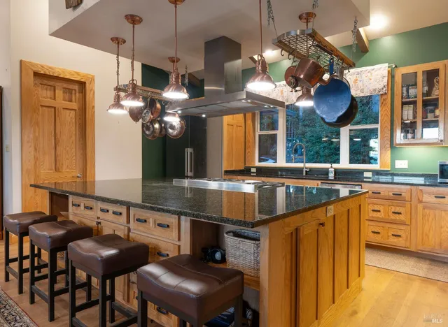 a front view of a house with a yard porch and outdoor seating