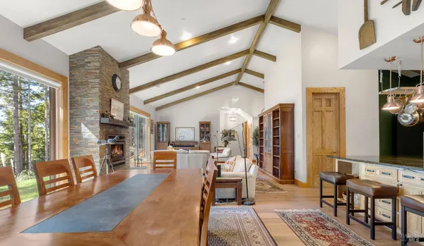 a view of a living room and dining room