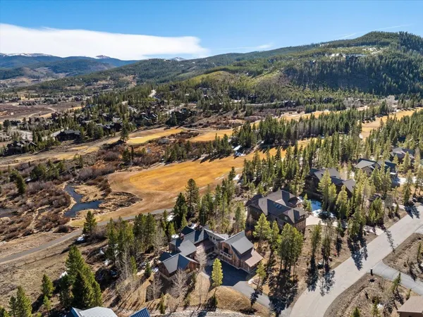 an aerial view of residential house and lake view