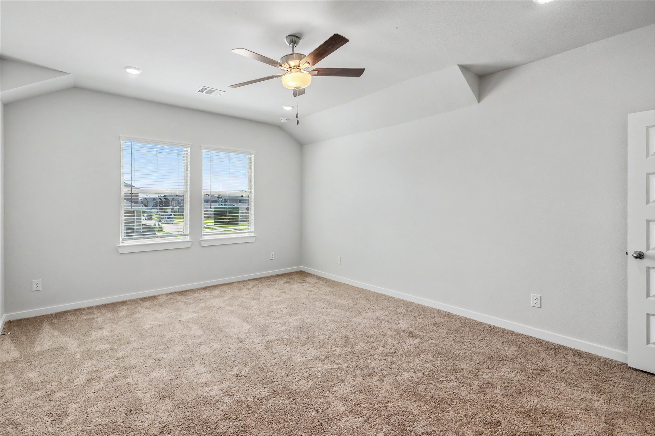 6426 Bolinas Court Rosharon, TX 77583 - Photo 23 of 49 an empty room with a window and ceiling fan
