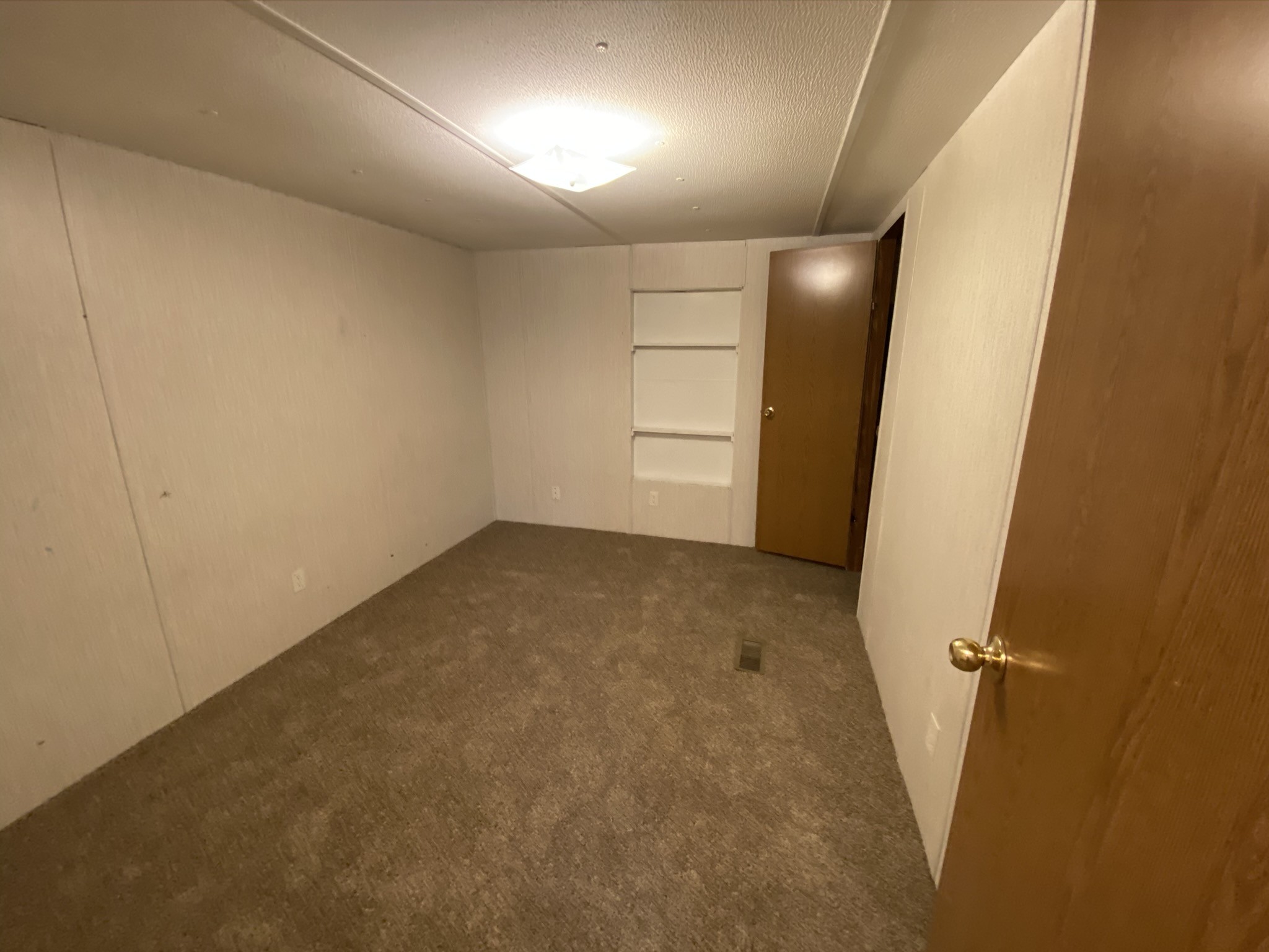 1340 Throneberry Road Normandy, TN 37360 - Photo 27 of 37 an empty room with a empty space