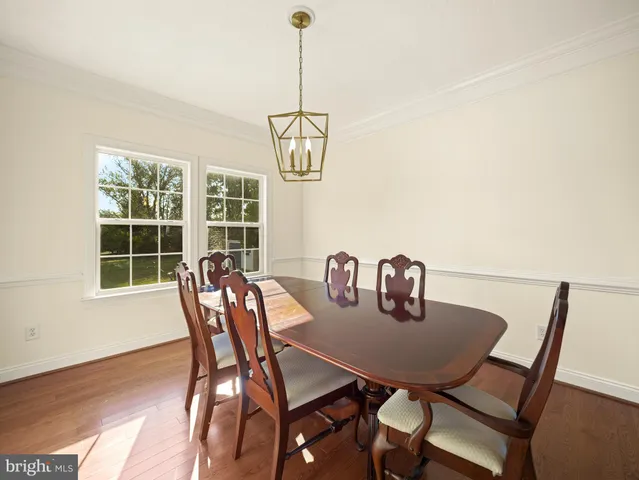 a view of an empty room with glass door