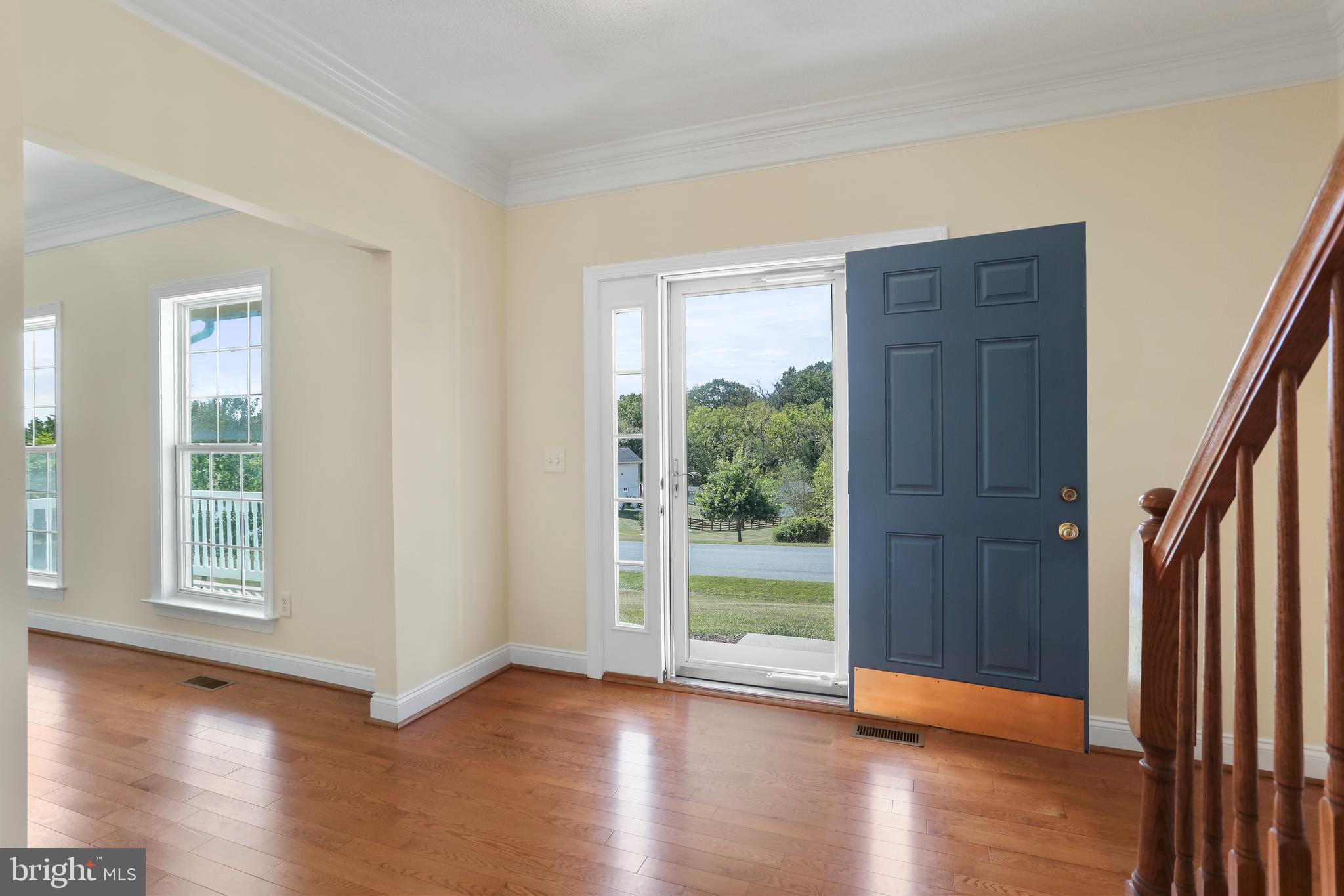 197 Triumphant Way Falling Waters, WV 25419 - Photo 9 of 58 Foyer with door open