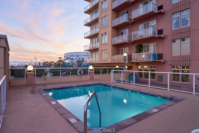 a view of a balcony with chairs