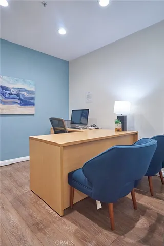 a room with gym equipment and mirror