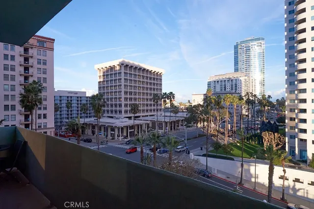 a view of city with tall buildings