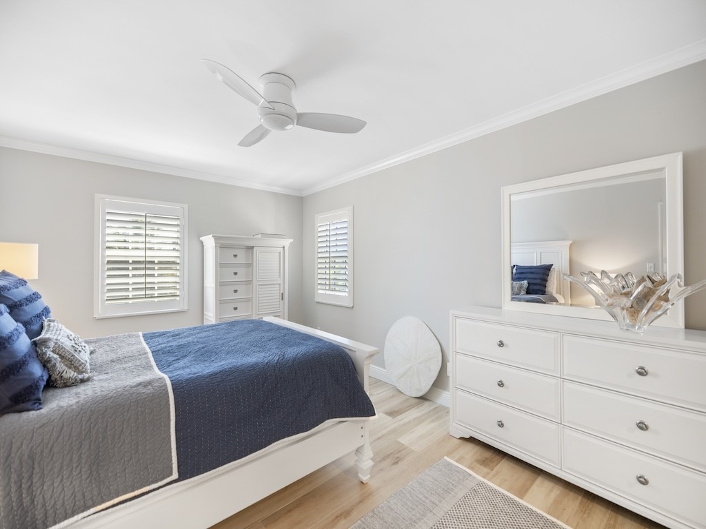 1180 Reef Road, Unit A24 Vero Beach, FL 32963 - Photo 11 of 26 a bedroom with a large bed and a window