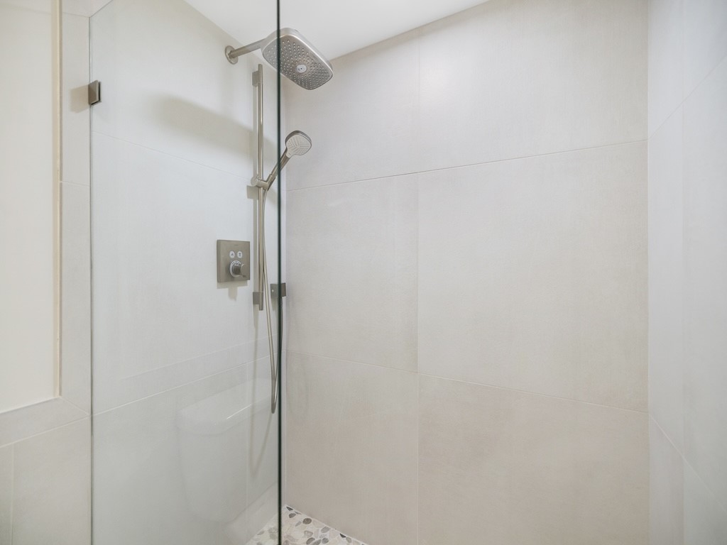 1180 Reef Road, Unit A24 Vero Beach, FL 32963 - Photo 14 of 26 a bathroom with a shower