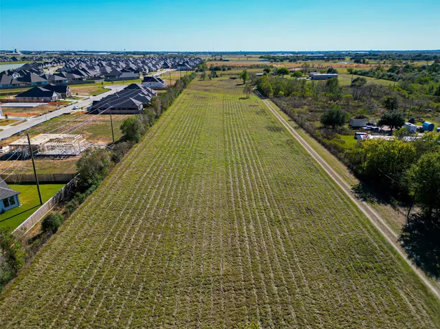 a view of a potted plant in front of a door