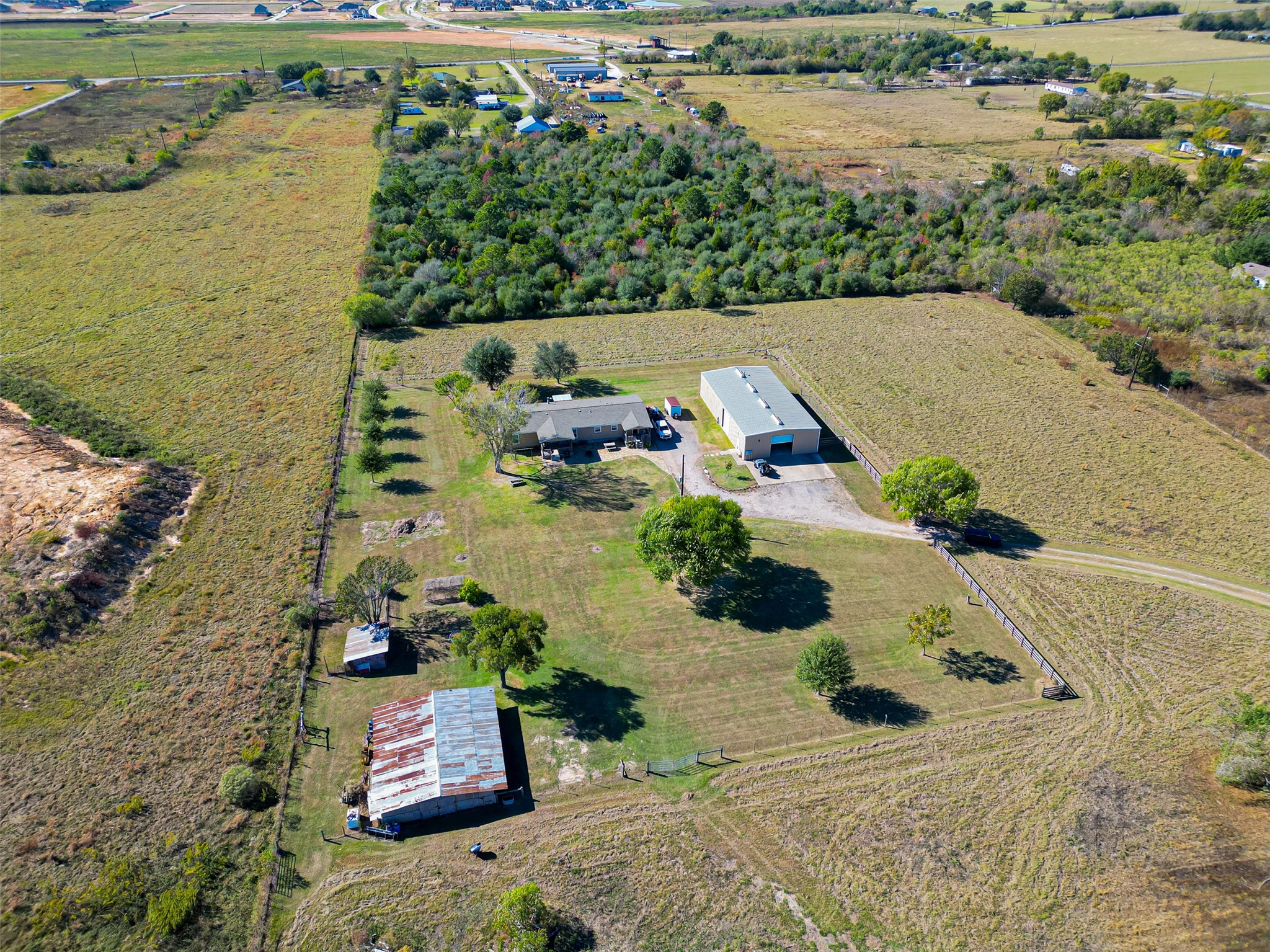 32445 Knebel Road Waller, TX 77484 - Photo 17 of 49 an aerial view of residential houses with outdoor space