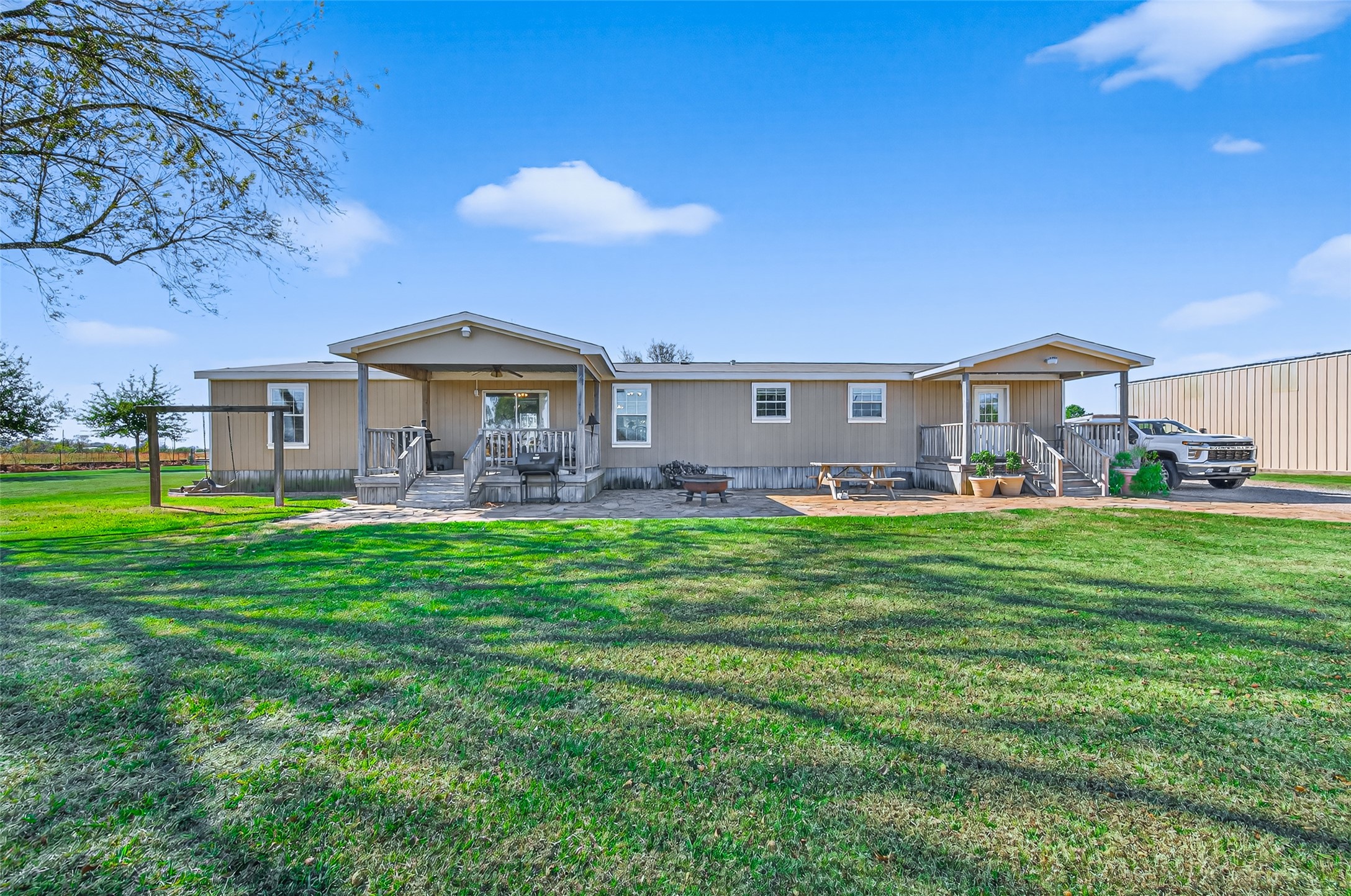32445 Knebel Road Waller, TX 77484 - Photo 19 of 49 a front view of a house with a garden