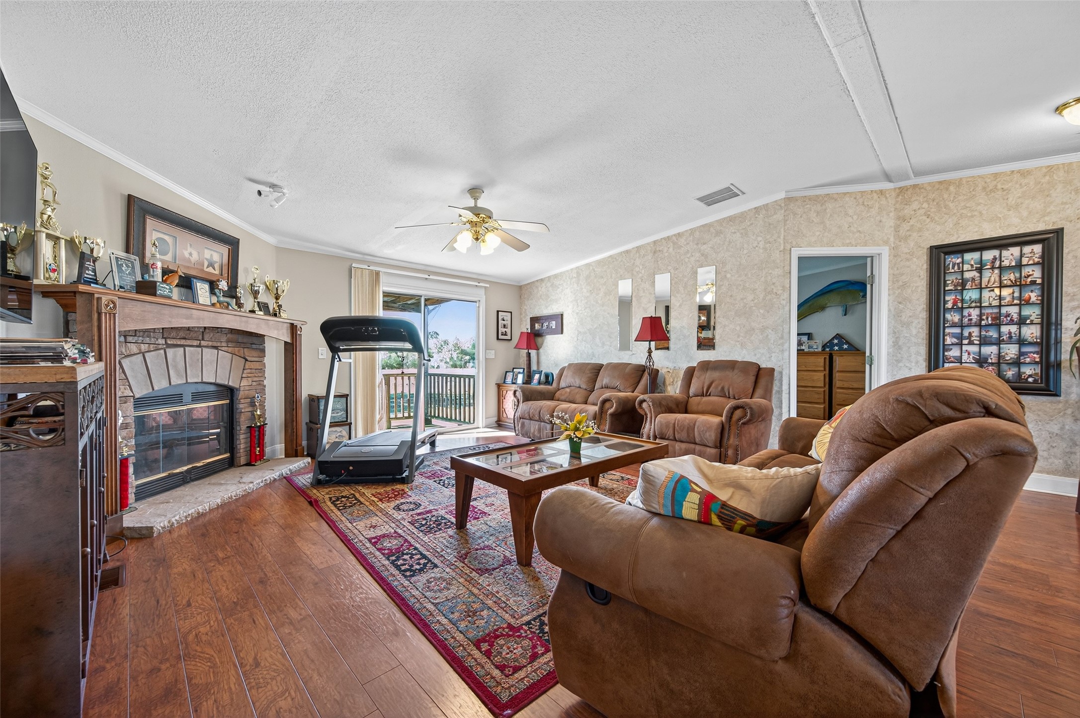 32445 Knebel Road Waller, TX 77484 - Photo 28 of 49 a living room with furniture fireplace and flat screen tv